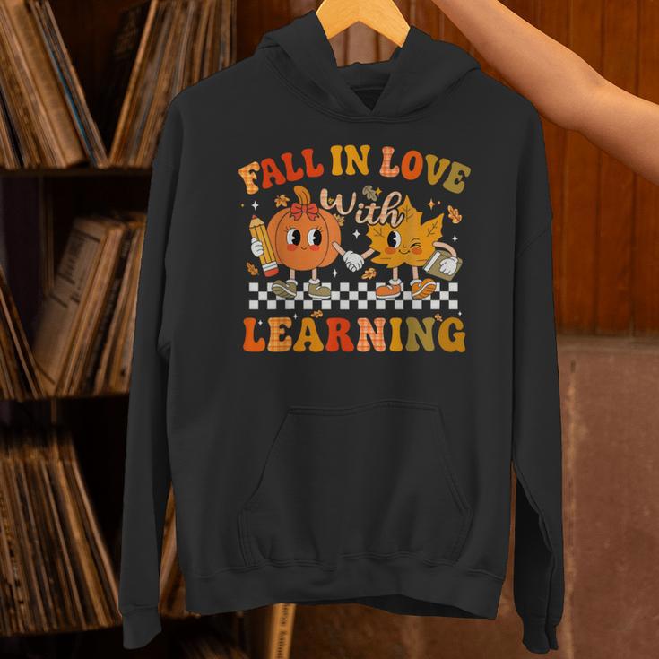 Fall In Love With Learning Autumn Pumpkin Fall Teacher Kids Unisex Hoodie, gift for family, gift for coworker Fall In Love With Learning Autumn Pumpkin Fall Teacher Kids Unisex Hoodie, gift for family, gift for coworker