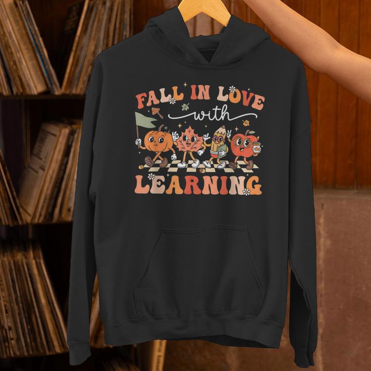 Fall In Love With Learning Autumn Teacher Thanksgiving Unisex Hoodie, gift for family, gift for coworker