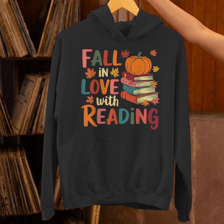 Fall In Love With Reading Autumn Thanksgiving Shirt Teacher Unisex Hoodie, gift for family, gift for coworker Fall In Love With Reading Autumn Thanksgiving Shirt Teacher Unisex Hoodie, gift for family, gift for coworker