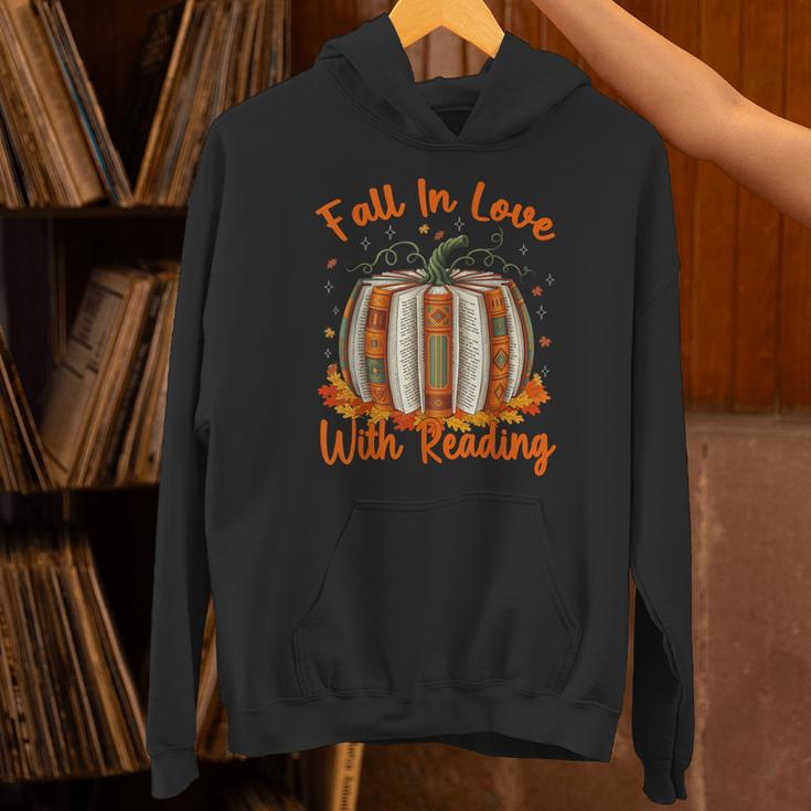 Fall In Love With Reading Pumpkin Autumn Librarians Teacher Unisex Hoodie, gift for family, gift for coworker Fall In Love With Reading Pumpkin Autumn Librarians Teacher Unisex Hoodie, gift for family, gift for coworker