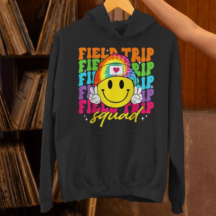 Field Trip Squad Groovy Field Day Smile Face Teacher Tie Dye Unisex Hoodie, Groovy Teacher Hoodies, gift for family, gift for coworker