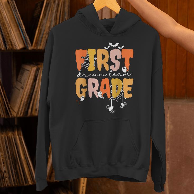 First Grade Dream Retro Team Fall Halloween Spooky Teachers Unisex Hoodie, First Grade Teacher Hoodies, gift for family, gift for coworker First Grade Dream Retro Team Fall Halloween Spooky Teachers Unisex Hoodie, First Grade Teacher Hoodies, gift for family, gift for coworker