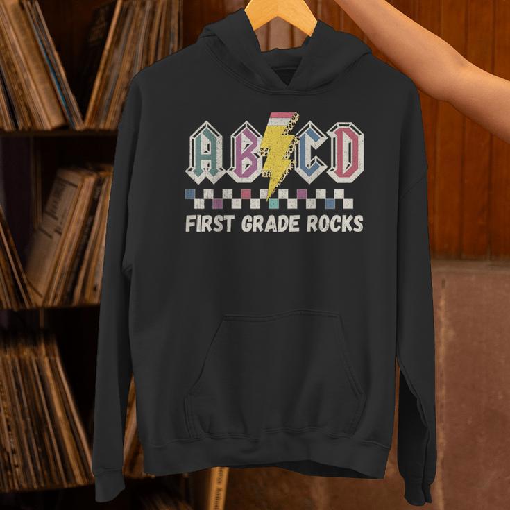 First Grade Rocks Teachers Back To School ABCD Rock Students Unisex Hoodie, First Grade Teacher Hoodies, gift for family, gift for coworker