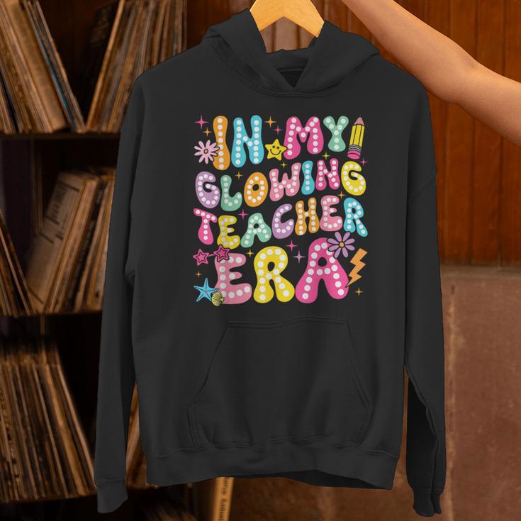 In My Glowing Teacher Era Teaching Back To School Unisex Hoodie, gift for family, gift for coworker In My Glowing Teacher Era Teaching Back To School Unisex Hoodie, gift for family, gift for coworker