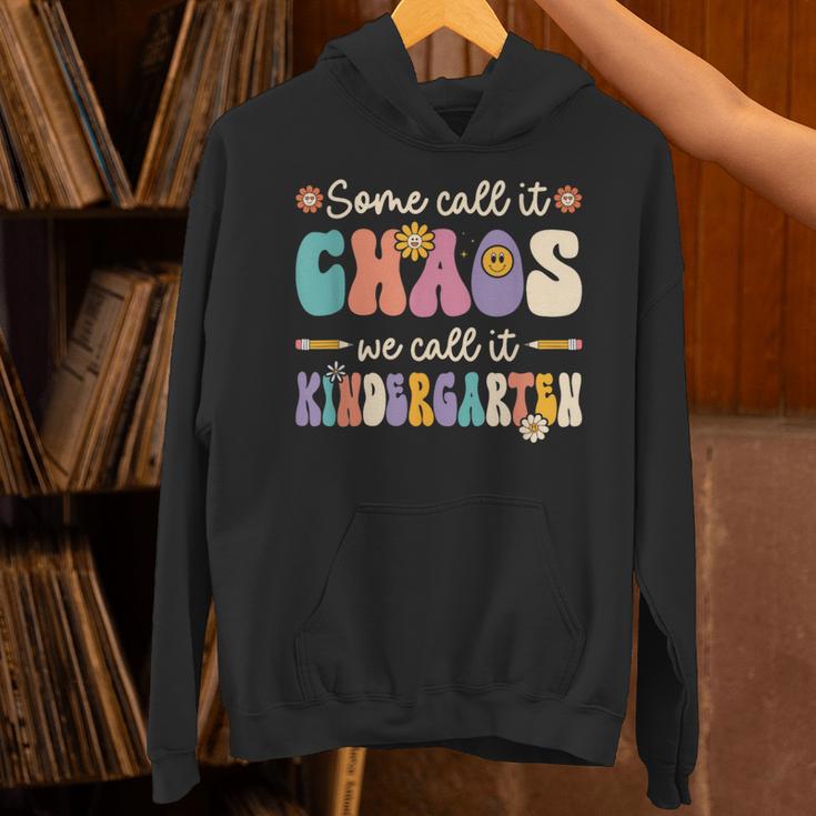 Groovy Some Call It Chaos We Call It Kindergarten Teacher Unisex Hoodie, Groovy Teacher Hoodies, gift for family, gift for coworker