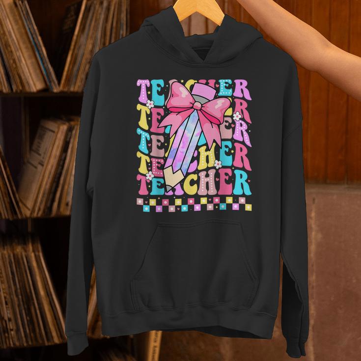 Groovy Teacher Cute Coquette Bow Flower Retro Back To School Unisex Hoodie, Groovy Teacher Hoodies, gift for family, gift for coworker Groovy Teacher Cute Coquette Bow Flower Retro Back To School Unisex Hoodie, Groovy Teacher Hoodies, gift for family, gift for coworker
