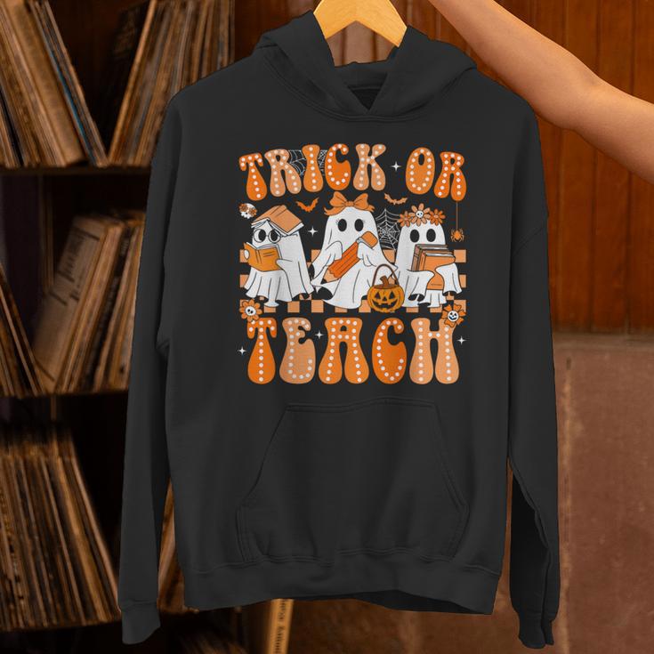 Groovy Teacher Halloween Trick Or Teach Ghost Men Women Kids Unisex Hoodie, Groovy Teacher Hoodies, gift for family, gift for coworker Groovy Teacher Halloween Trick Or Teach Ghost Men Women Kids Unisex Hoodie, Groovy Teacher Hoodies, gift for family, gift for coworker