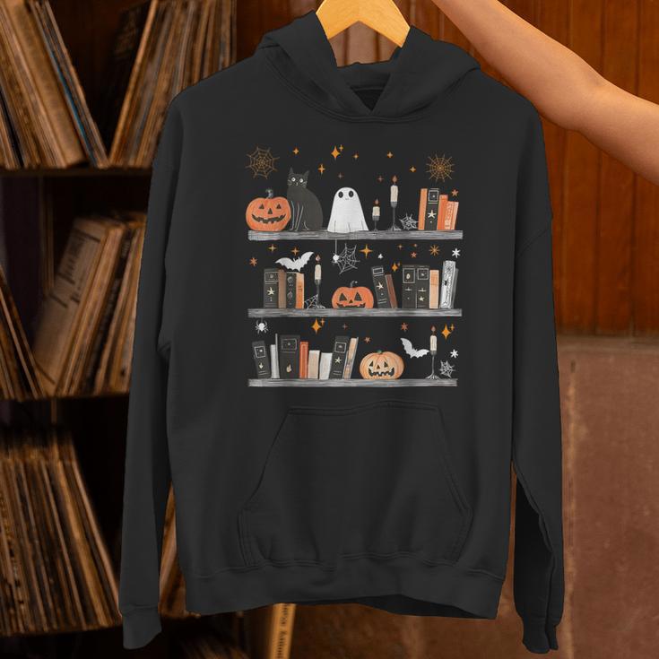 Halloween Library Ghost Books Teacher Spooky Trick Or Teach Unisex Hoodie, gift for family, gift for coworker