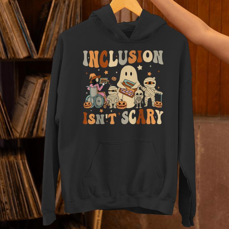Halloween SLP Sped Teacher Groovy Inclusion Isn't Scary Unisex Hoodie, Groovy Teacher Hoodies, gift for family, gift for coworker