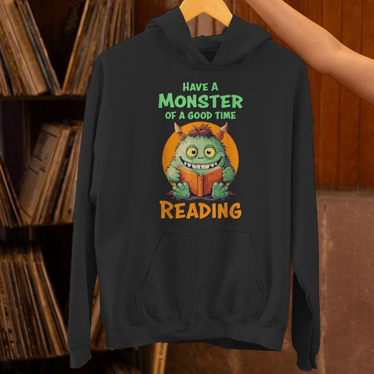 Halloween Teacher Librarian Monster Reading Books Men Women Kids Unisex Hoodie, gift for family, gift for coworker Halloween Teacher Librarian Monster Reading Books Men Women Kids Unisex Hoodie, gift for family, gift for coworker