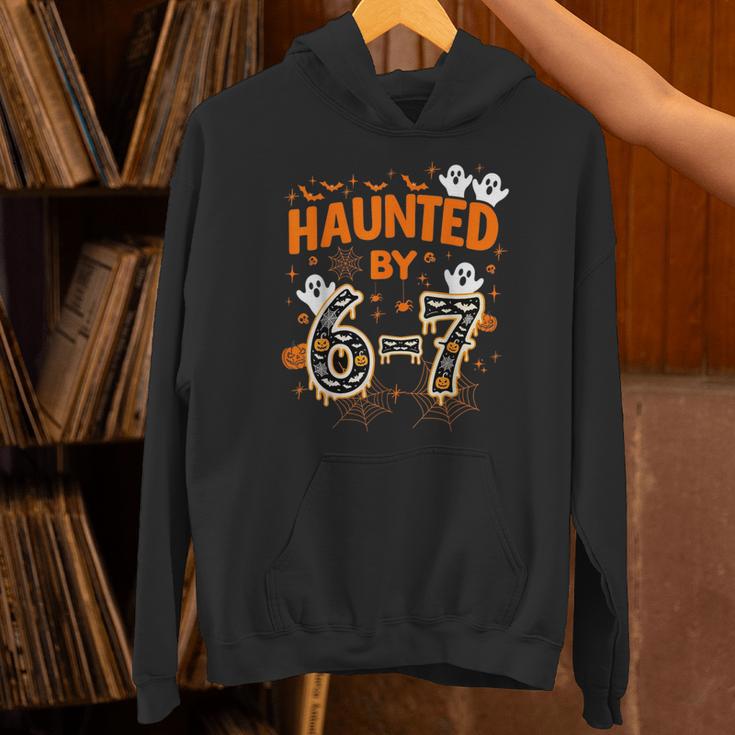 Haunted By 6-7 Halloween Math Teacher Joke Unisex Hoodie, gift for family, gift for coworker