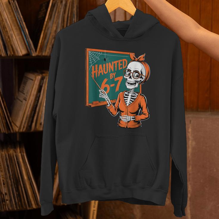 Haunted By 6-7 Six Seven 67 Math Teacher Halloween Skeleton Unisex Hoodie, gift for family, gift for coworker