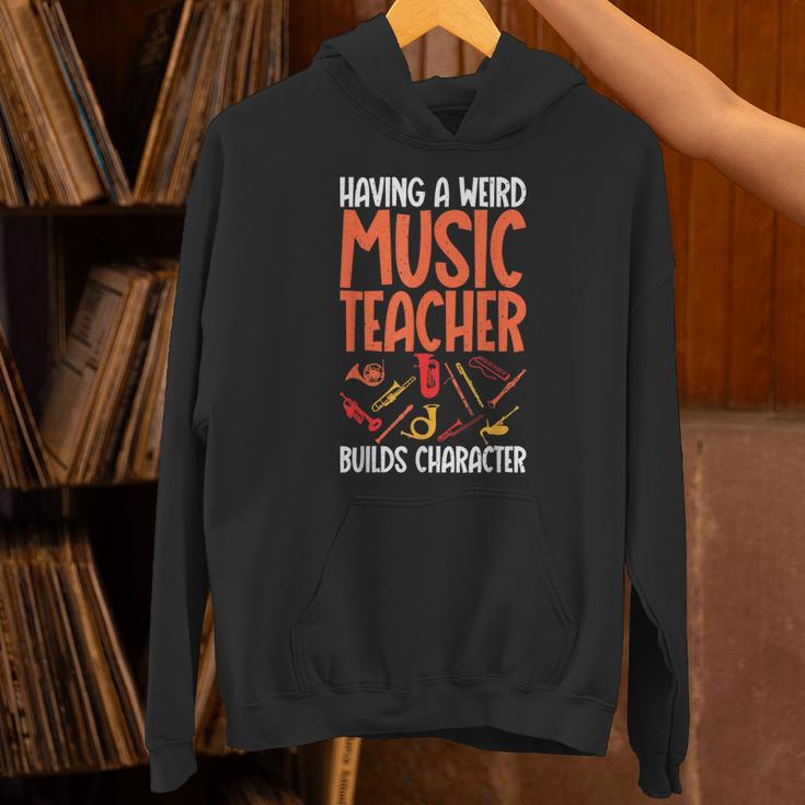 Having a Weird Music Teacher Builds Character Music Teacher Unisex Hoodie, gift for family, gift for coworker Having a Weird Music Teacher Builds Character Music Teacher Unisex Hoodie, gift for family, gift for coworker
