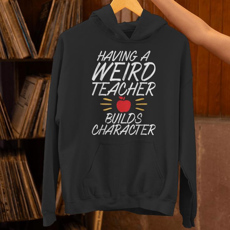Having a Weird Teacher Builds Character School Teacher Unisex Hoodie, gift for family, gift for coworker Having a Weird Teacher Builds Character School Teacher Unisex Hoodie, gift for family, gift for coworker