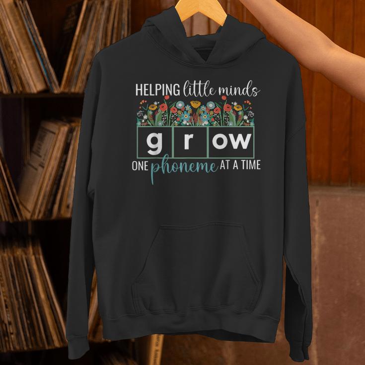Helping Little Minds Grow One Phoneme At A Time Teacher Unisex Hoodie, gift for family, gift for coworker