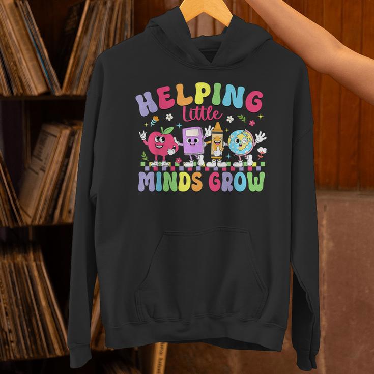 Helping Little Minds Grow Teacher Life Back To School Unisex Hoodie, gift for family, gift for coworker Helping Little Minds Grow Teacher Life Back To School Unisex Hoodie, gift for family, gift for coworker