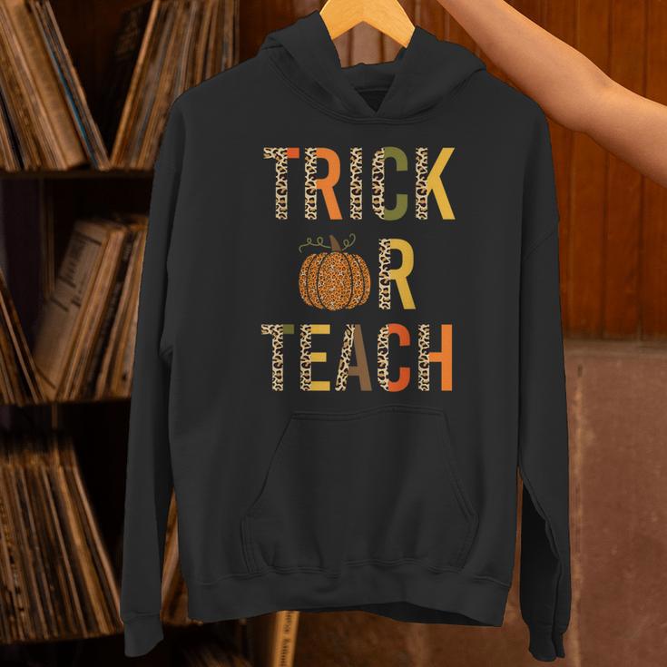 Leopard Trick Or Teach Halloween Teacher Costume Women Unisex Hoodie, gift for family, gift for coworker Leopard Trick Or Teach Halloween Teacher Costume Women Unisex Hoodie, gift for family, gift for coworker
