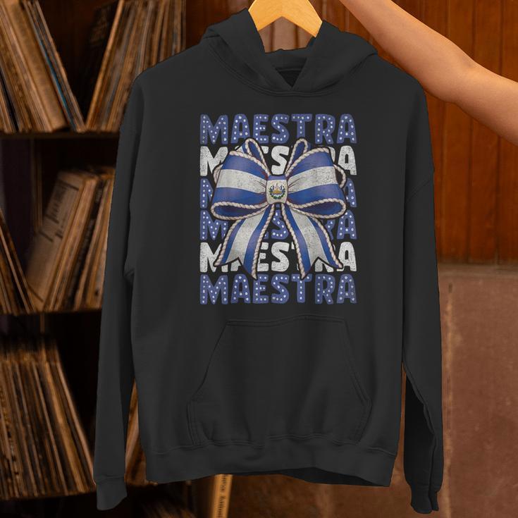Maestra El Salvador Coquette Bow Hispanic Spanish Teacher Unisex Hoodie, gift for family, gift for coworker Maestra El Salvador Coquette Bow Hispanic Spanish Teacher Unisex Hoodie, gift for family, gift for coworker