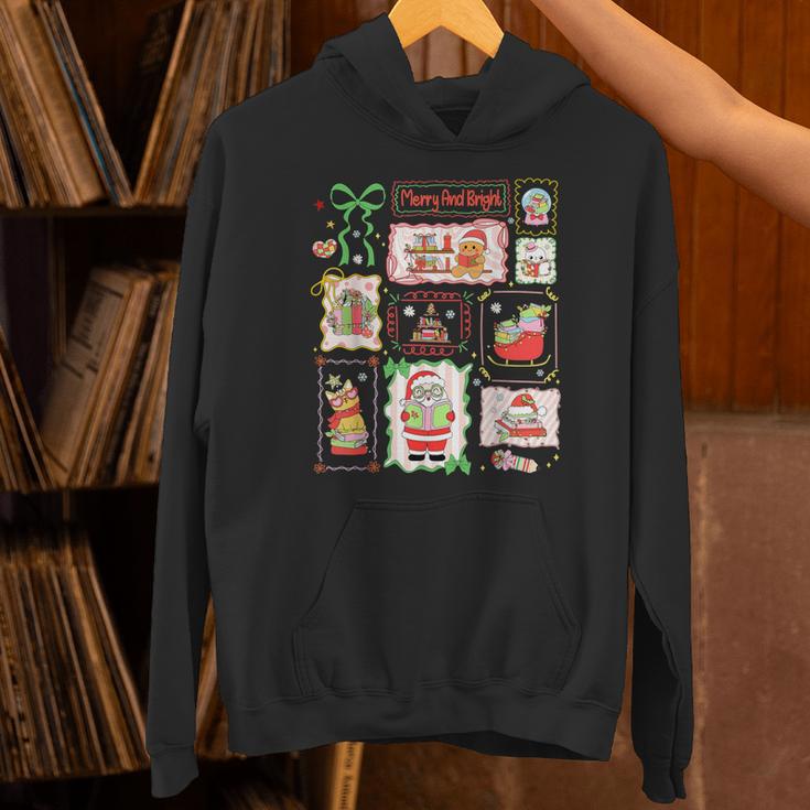 Merry And Bright Christmas Gingerbread Santa Book Teacher Unisex Hoodie, gift for family, gift for coworker Merry And Bright Christmas Gingerbread Santa Book Teacher Unisex Hoodie, gift for family, gift for coworker