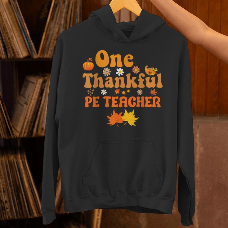 One Thankful PE Teacher Thanksgiving Fall Autumn Groovy Unisex Hoodie, Pe Teacher Hoodies, Groovy Teacher Hoodies, gift for family, gift for coworker