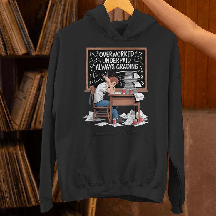 Overworked Underpaid Always Grading Teacher Unisex Hoodie, gift for family, gift for coworker Overworked Underpaid Always Grading Teacher Unisex Hoodie, gift for family, gift for coworker