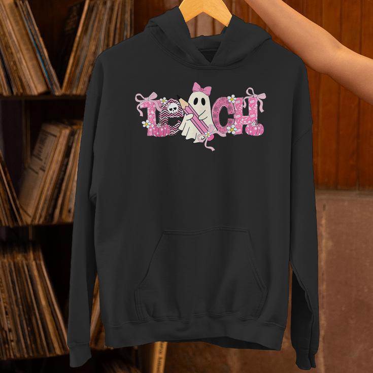 Pink Ghost Teach Halloween Teacher In Spooky Season Unisex Hoodie, gift for family, gift for coworker