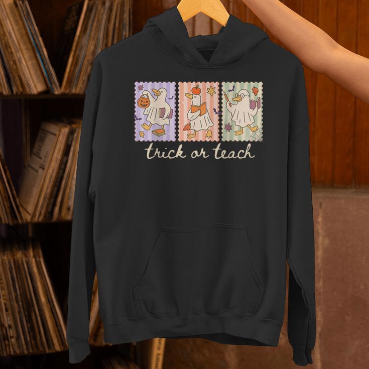 Preppy Goose Teacher Trick Or Teach Halloween Teacher Goose Unisex Hoodie, gift for family, gift for coworker Preppy Goose Teacher Trick Or Teach Halloween Teacher Goose Unisex Hoodie, gift for family, gift for coworker