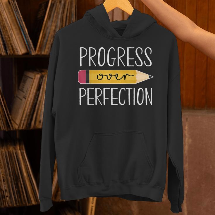 Progress Over Perfection Motivational Back To School Teacher Unisex Hoodie, gift for family, gift for coworker Progress Over Perfection Motivational Back To School Teacher Unisex Hoodie, gift for family, gift for coworker