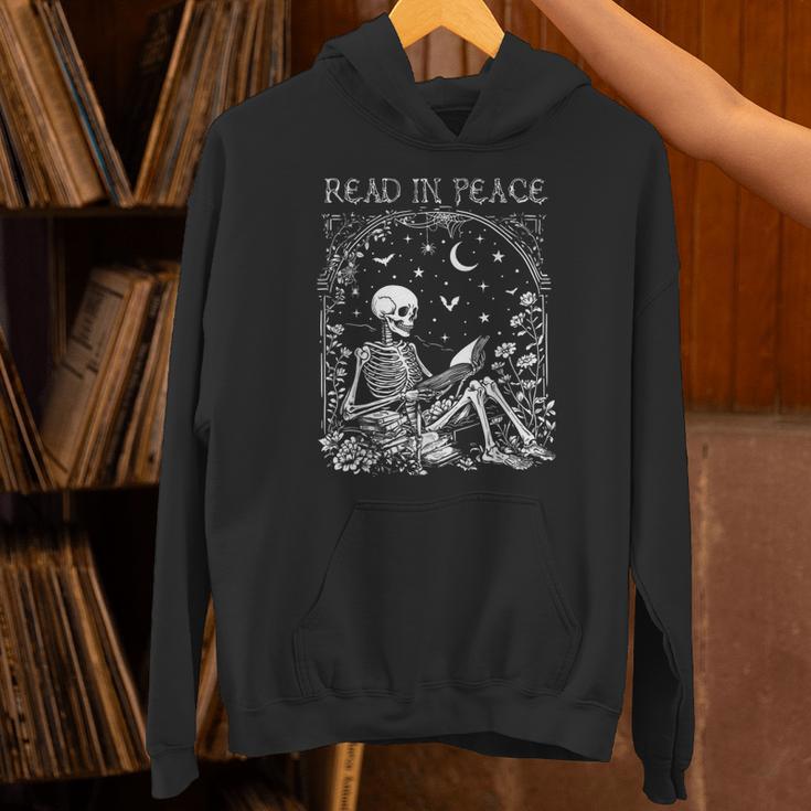 Read In Peace Skeleton Reading Teacher Spooky Halloween Unisex Hoodie, gift for family, gift for coworker Read In Peace Skeleton Reading Teacher Spooky Halloween Unisex Hoodie, gift for family, gift for coworker