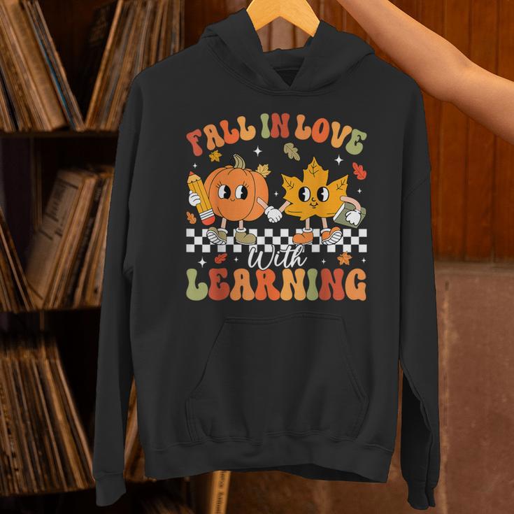 Retro Pumpkin Fall In Love With Learning Autumn Teacher Unisex Hoodie, gift for family, gift for coworker Retro Pumpkin Fall In Love With Learning Autumn Teacher Unisex Hoodie, gift for family, gift for coworker