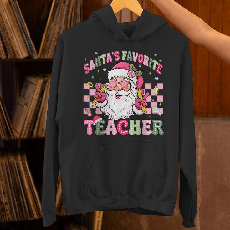 Santa's Favorite Teacher Groovy Christmas Teacher Boys Girls Unisex Hoodie, Groovy Teacher Hoodies, gift for family, gift for coworker