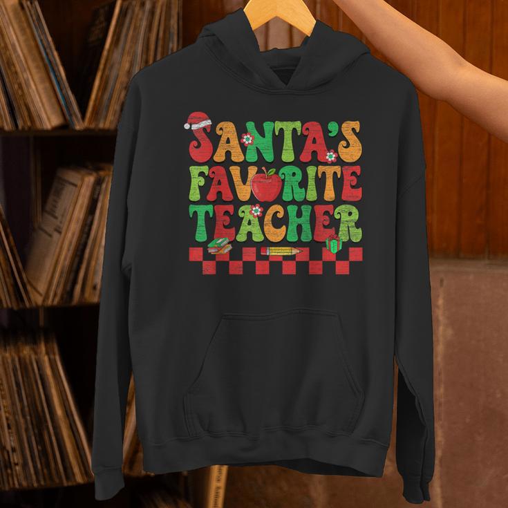 Santas Favorite Teacher Retro Groovy Christmas Xmas Women Unisex Hoodie, Groovy Teacher Hoodies, gift for family, gift for coworker