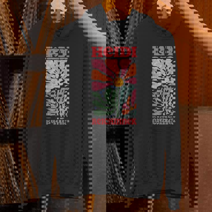 Tax The Rich ファン記事 左 Merch ハイジ・ライチネク パーカー