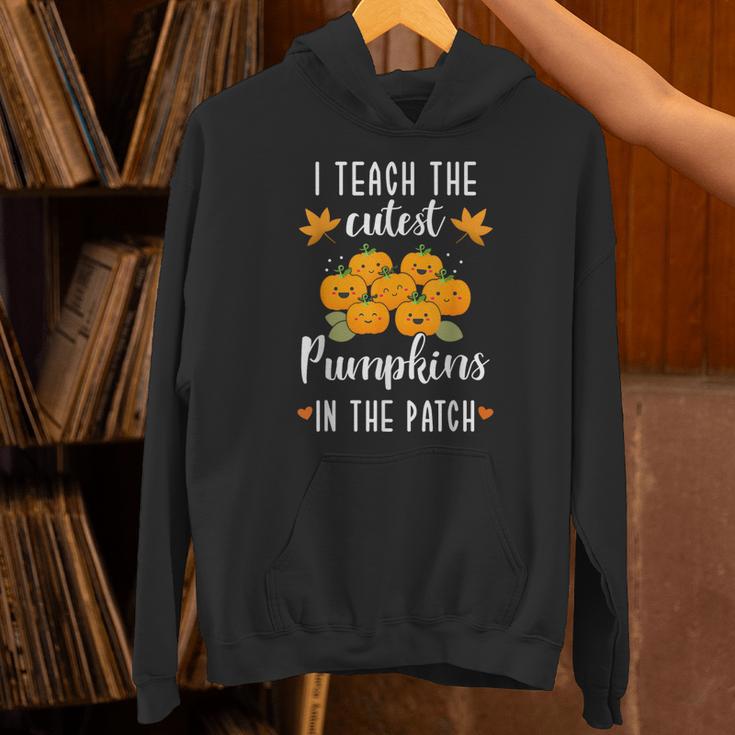 I Teach The Cutest Pumpkins In The Patch Halloween Teacher Unisex Hoodie, gift for family, gift for coworker I Teach The Cutest Pumpkins In The Patch Halloween Teacher Unisex Hoodie, gift for family, gift for coworker