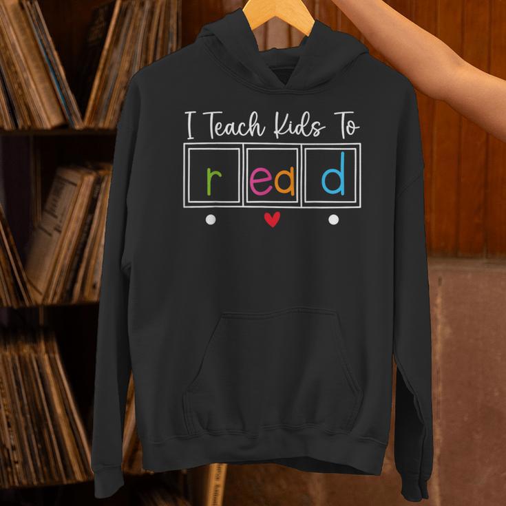 I Teach Kids To Read Reading Teacher Appreciation Unisex Hoodie, gift for family, gift for coworker
