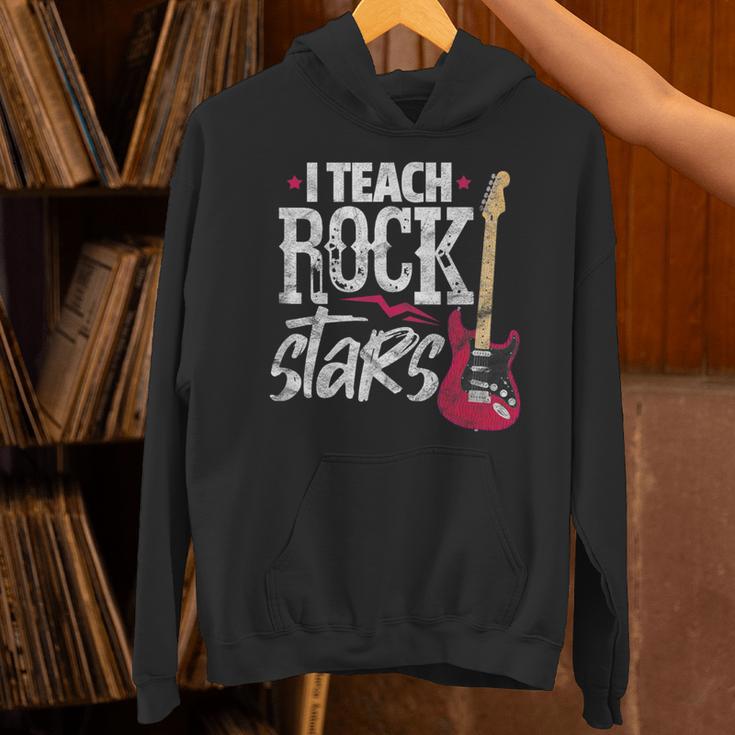 I Teach Rock Stars Music Teacher Guitar Player Unisex Hoodie, gift for family, gift for coworker I Teach Rock Stars Music Teacher Guitar Player Unisex Hoodie, gift for family, gift for coworker