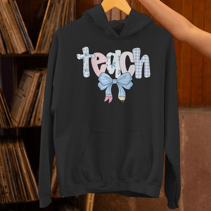 Teach Teacher Coquette Bow Pencil Back To School First Day Unisex Hoodie, gift for family, gift for coworker Teach Teacher Coquette Bow Pencil Back To School First Day Unisex Hoodie, gift for family, gift for coworker