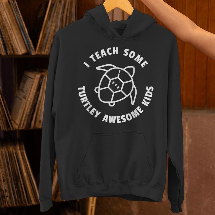 I Teach Some Turtley Awesome Kids Teacher Turtle Pun Unisex Hoodie, gift for family, gift for coworker