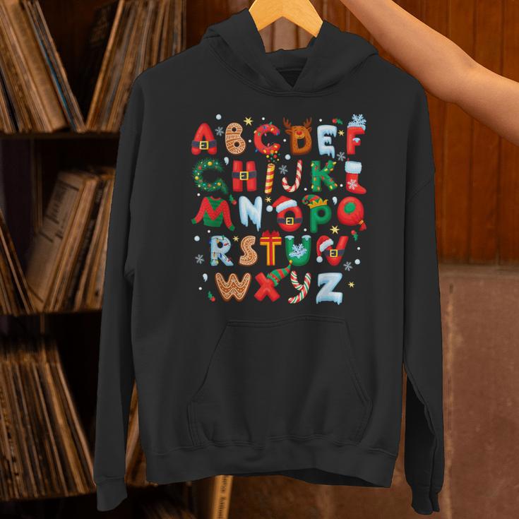 Teacher Christmas Alphabet Back To School Holiday Learning Unisex Hoodie, gift for family, gift for coworker Teacher Christmas Alphabet Back To School Holiday Learning Unisex Hoodie, gift for family, gift for coworker