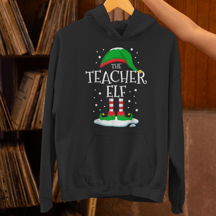 The Teacher Elf Christmas Family Matching Xmas Group For Men Women Unisex Hoodie, gift for family, gift for coworker The Teacher Elf Christmas Family Matching Xmas Group For Men Women Unisex Hoodie, gift for family, gift for coworker