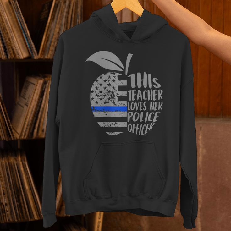 This Teacher Loves Her Police Officer Wife Saying Unisex Hoodie, gift for family, gift for coworker