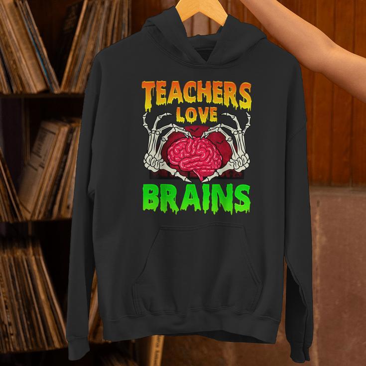 Teacher Teachers Love Brains Skeleton Hand Heart Halloween Unisex Hoodie, gift for family, gift for coworker