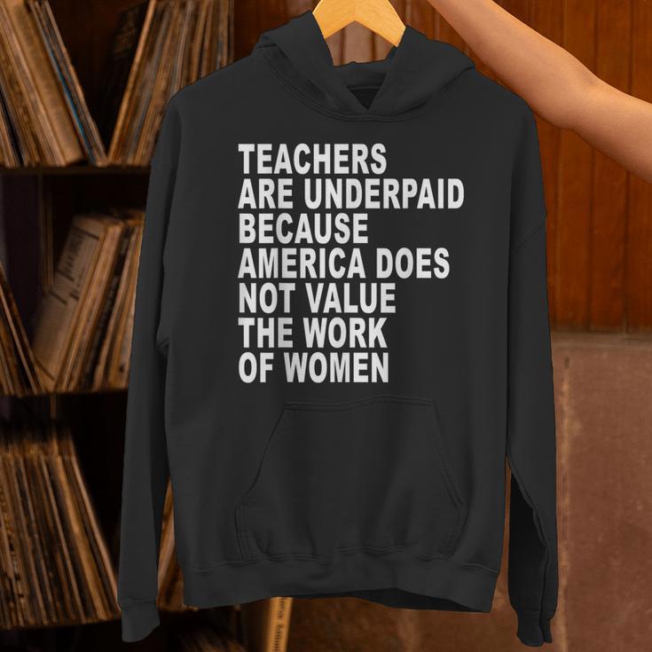 Teachers Are Underpaid Because America Does Not Value Men Women Unisex Hoodie, gift for family, gift for coworker Teachers Are Underpaid Because America Does Not Value Men Women Unisex Hoodie, gift for family, gift for coworker