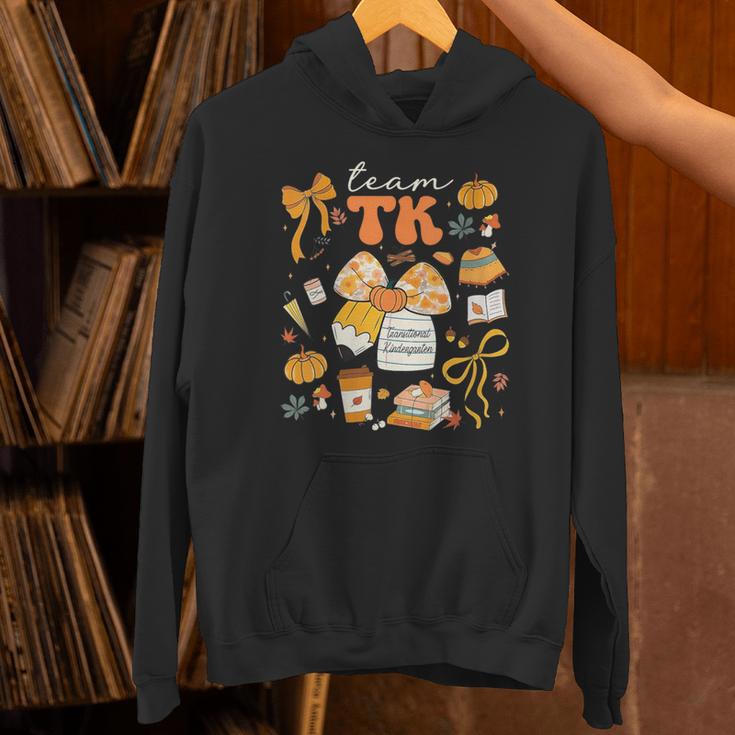 Team TK Crew Preppy Coquette Bow Pumpkin Fall TK Teacher Unisex Hoodie, gift for family, gift for coworker Team TK Crew Preppy Coquette Bow Pumpkin Fall TK Teacher Unisex Hoodie, gift for family, gift for coworker