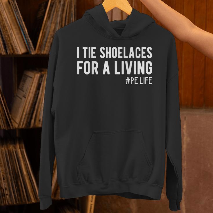 I Tie Shoelaces For a Living Elementary PE Teacher Unisex Hoodie, Pe Teacher Hoodies, gift for family, gift for coworker I Tie Shoelaces For a Living Elementary PE Teacher Unisex Hoodie, Pe Teacher Hoodies, gift for family, gift for coworker
