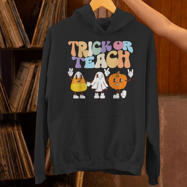 Trick Or Teach Cute Halloween Teacher Unisex Hoodie, gift for family, gift for coworker Trick Or Teach Cute Halloween Teacher Unisex Hoodie, gift for family, gift for coworker