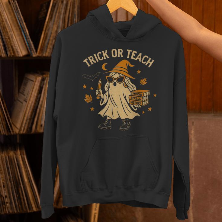 Trick Or Teach Halloween Teacher Unisex Hoodie, gift for family, gift for coworker