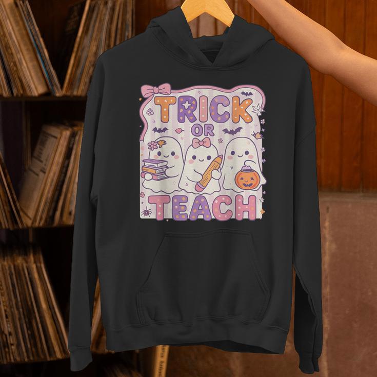 Trick Or Teach Retro Halloween Teacher Look Unisex Hoodie, gift for family, gift for coworker