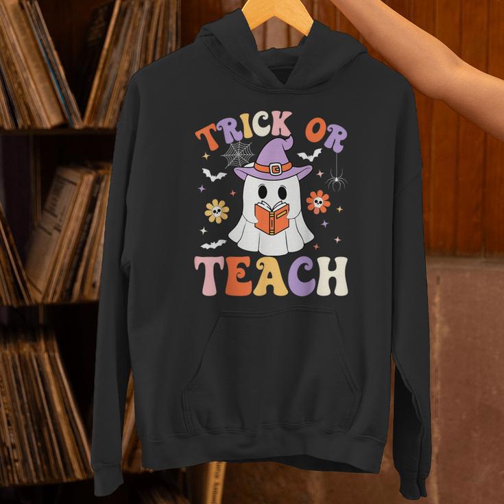 Trick Or Teach Teacher Groovy Ghost Halloween Teacher Unisex Hoodie, Groovy Teacher Hoodies, gift for family, gift for coworker Trick Or Teach Teacher Groovy Ghost Halloween Teacher Unisex Hoodie, Groovy Teacher Hoodies, gift for family, gift for coworker