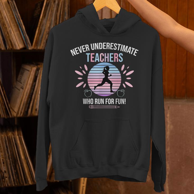 Never Underestimate Teachers Who Runs For Fun Unisex Hoodie, gift for family, gift for coworker Never Underestimate Teachers Who Runs For Fun Unisex Hoodie, gift for family, gift for coworker